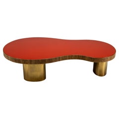 A Kidney-shaped Coffee Table with Brass Legs