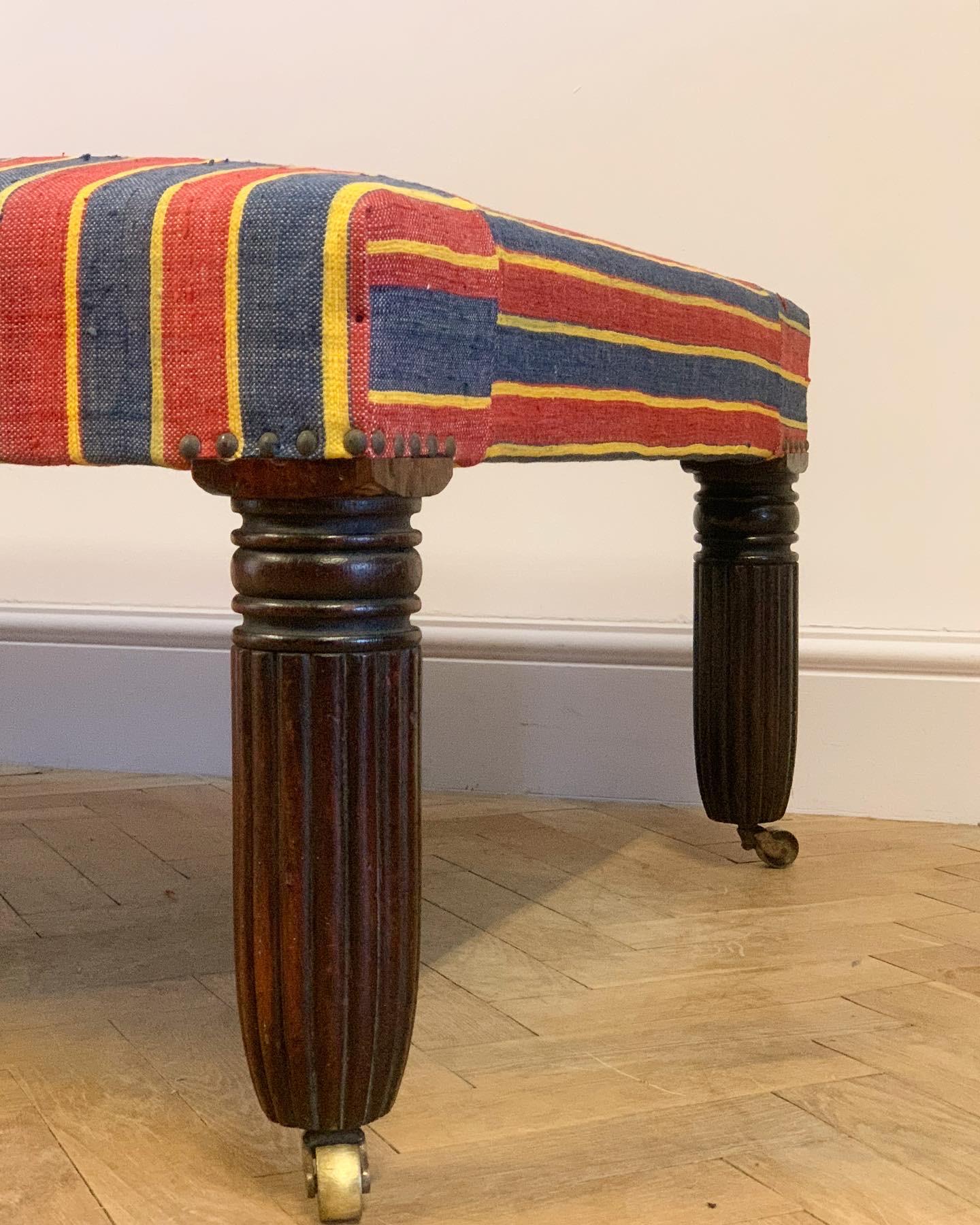 British Kilim Upholstered Stool on Reeded Nineteenth Century Legs For Sale