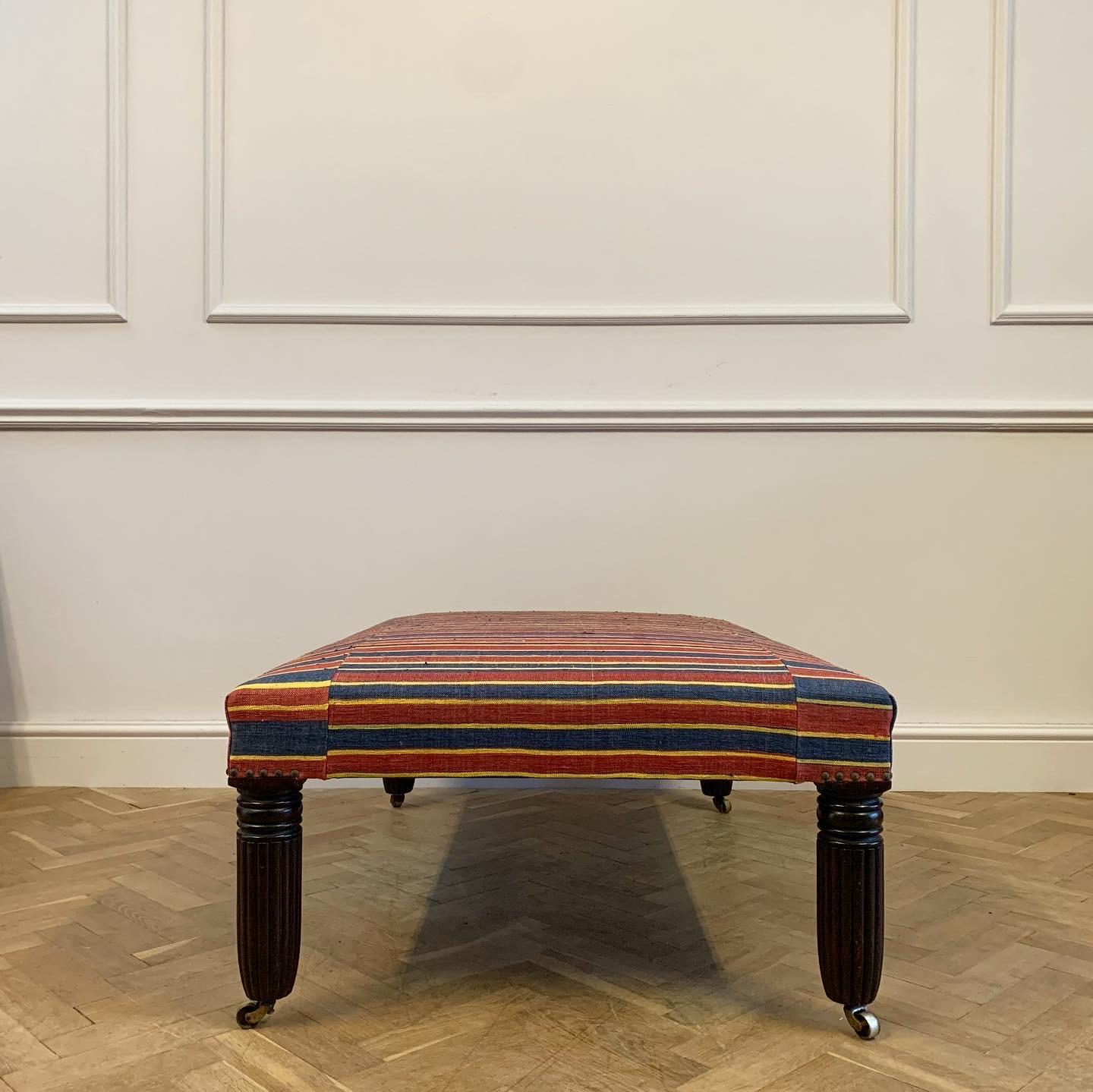 Hand-Woven Kilim Upholstered Stool on Reeded Nineteenth Century Legs For Sale