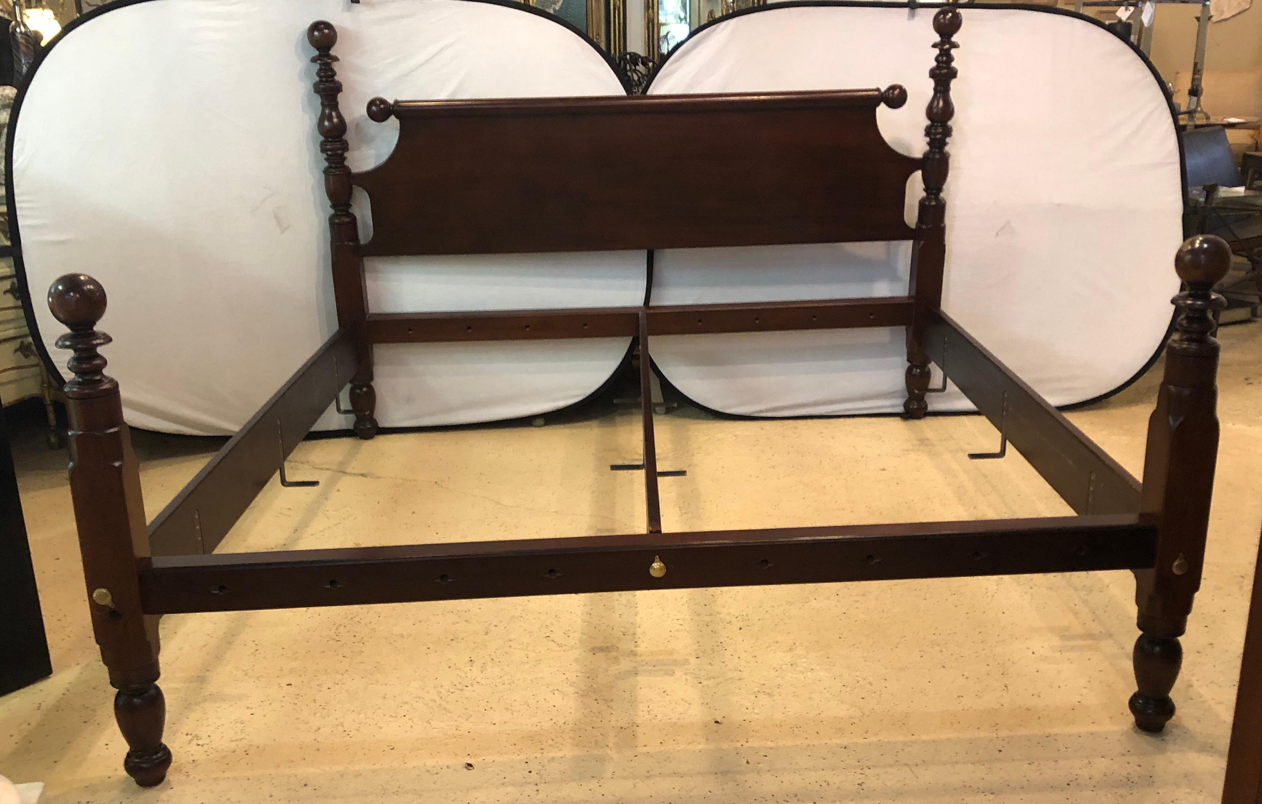 A fine sturdy King sized four poster bed by Leonard's Sackonk Ma. This is the widely acclaimed Cannonball and Bell Bed in Maple having the original posts, circa 1830s resized to a King sized bed. Lists at Leonard's is $9200 plus tax and delivery.