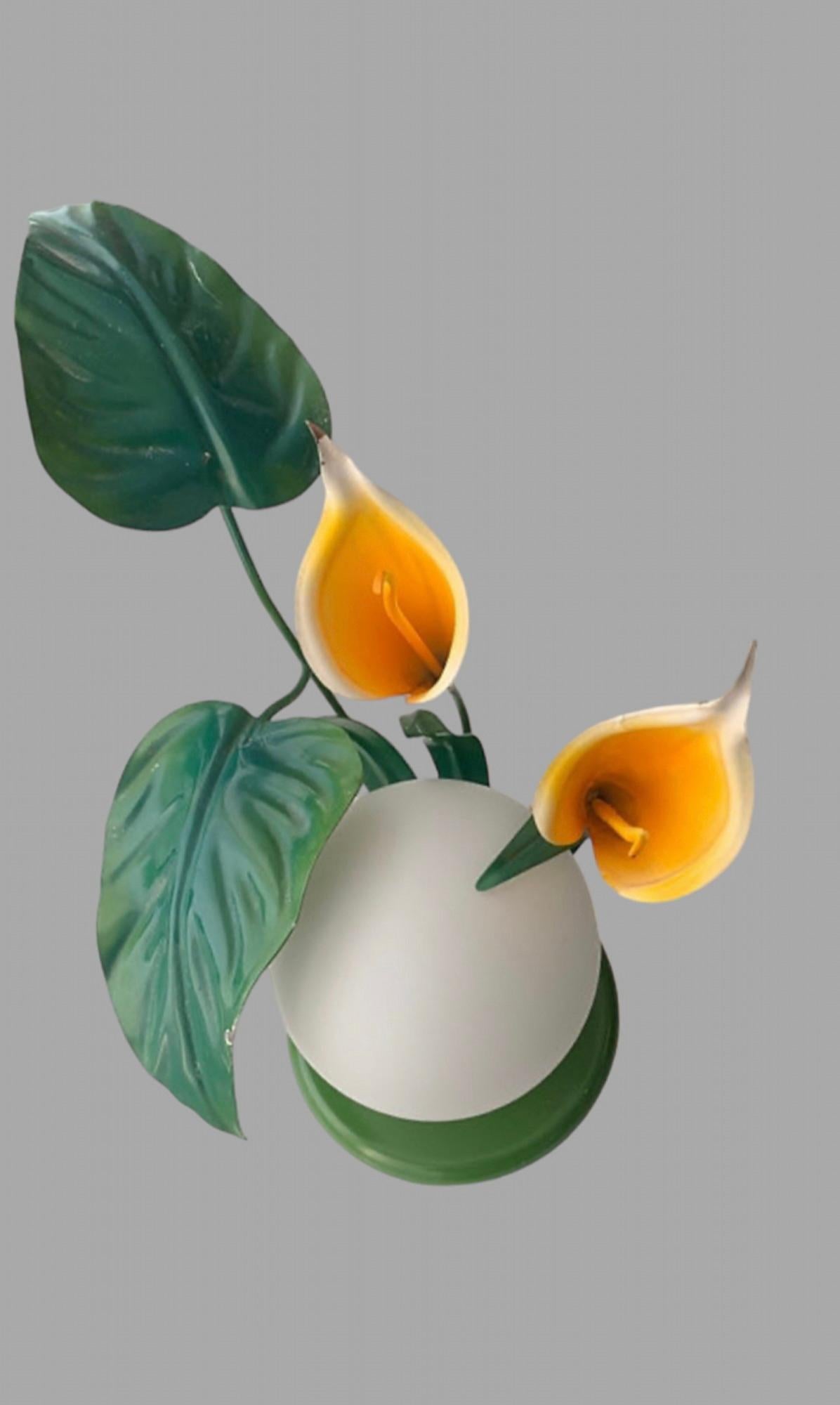 A Fantastically Kitsch 1960s Italian Metal Orb Table Lamp with Realistic Nalla Lilies and leaves. This table lamp goes with two matching chandeliers in the same style that we also have available. Please see our Lighting section for more information.