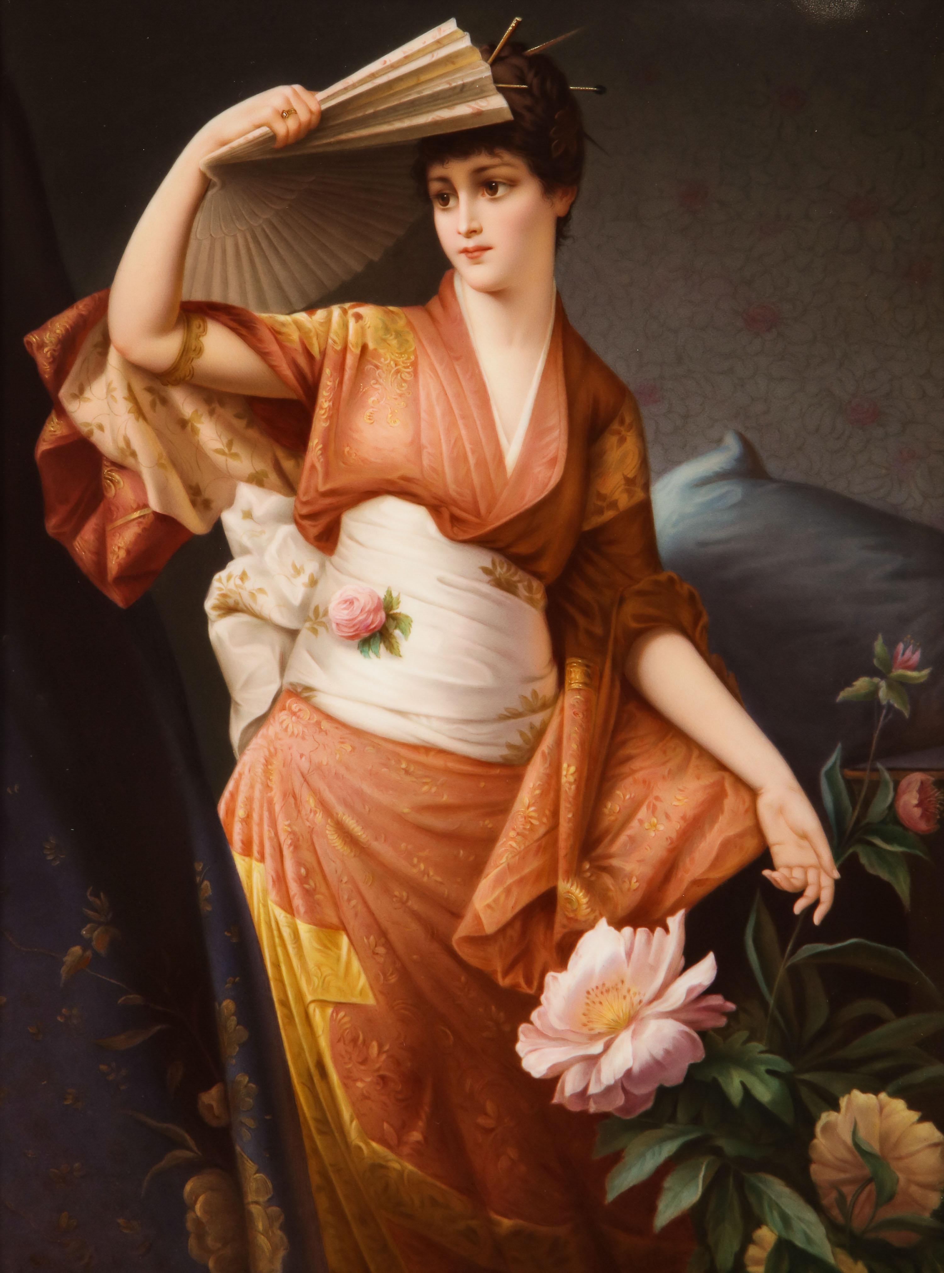 A Gorgeous 19th Century KPM Hand-Painted Porcelain Plaque of a Japonism Beauty, Signed by the Artist Wagner Wien .n C. Kiesel. The beauty is seen in a beautiful orange and white kimono, holding a fan while standing in a rose garden. The porcelain is