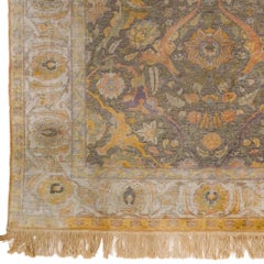 A Kum Kapi Silk and Metal Thread Rug