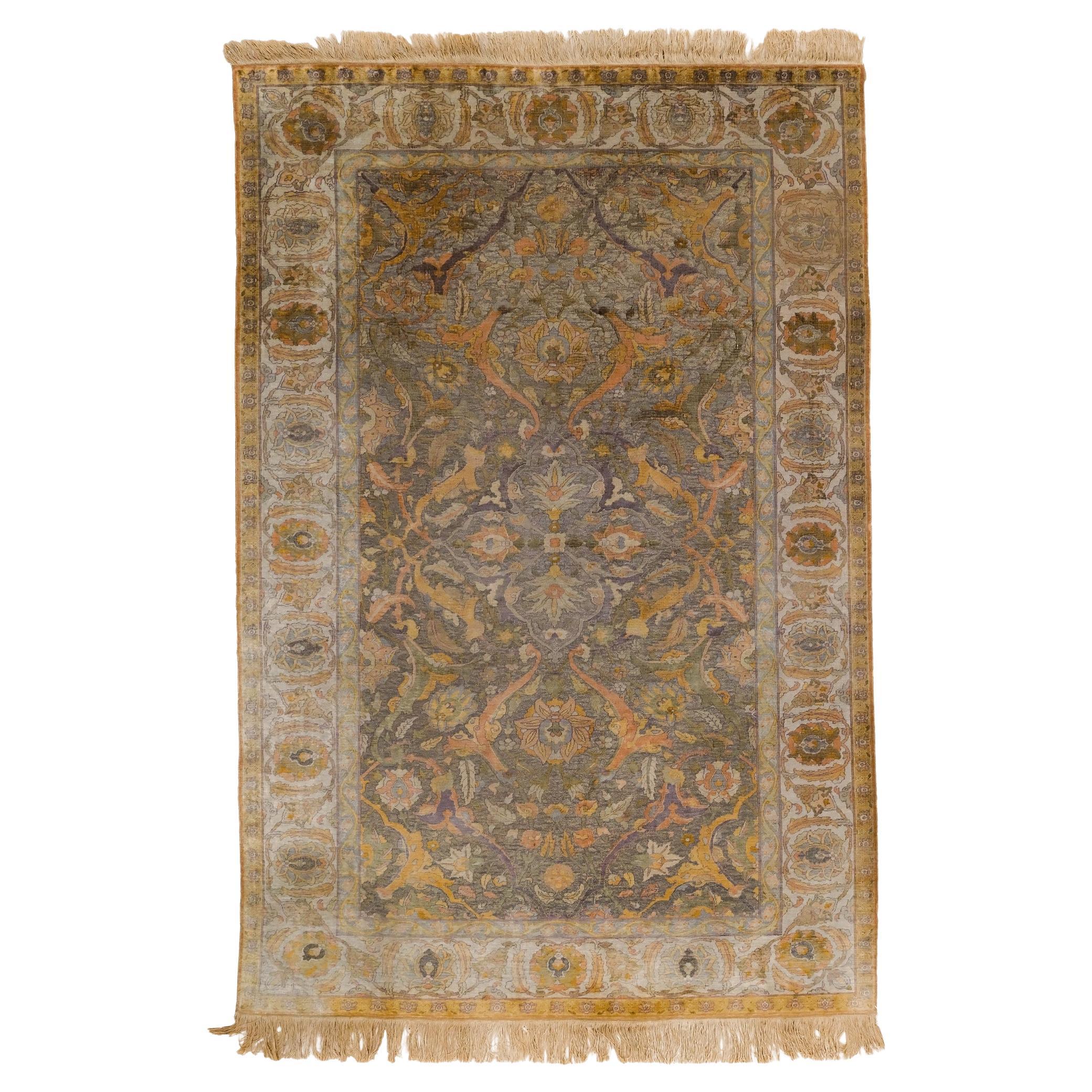 A Kum Kapi Silk and Metal Thread Rug