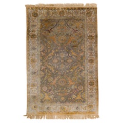 A Kum Kapi Silk and Metal Thread Rug