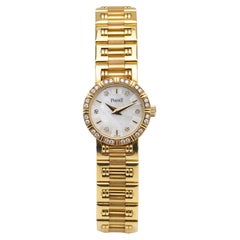 A ladies’  Piaget Mini Dancer 18kt yellow gold and diamond bracelet wristwatch 