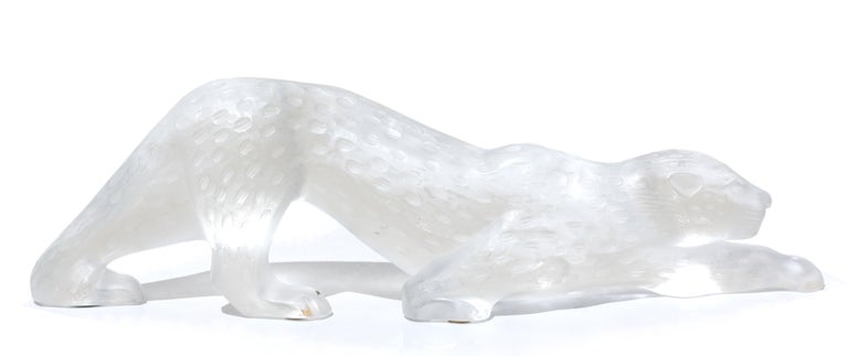 A Lalique clear and frosted crystal figure of a panther, Zeila
France, 20th century
Script marks, Lalique France
Measure: Length 14.5 in. (36.83 cm.).