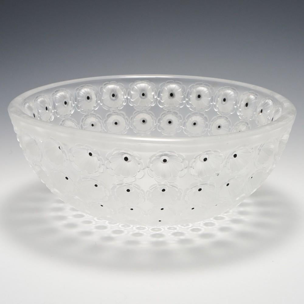 A Lalique Nemours Bowl, Designed 1929

Additional information:
Date : Designed 1929. Marcilhac 404
Origin : Wingen sur Moder, France
Bowl Features : Frosted with sepia staining inside the cactus eyes and dark brown enamelling within
Marks :