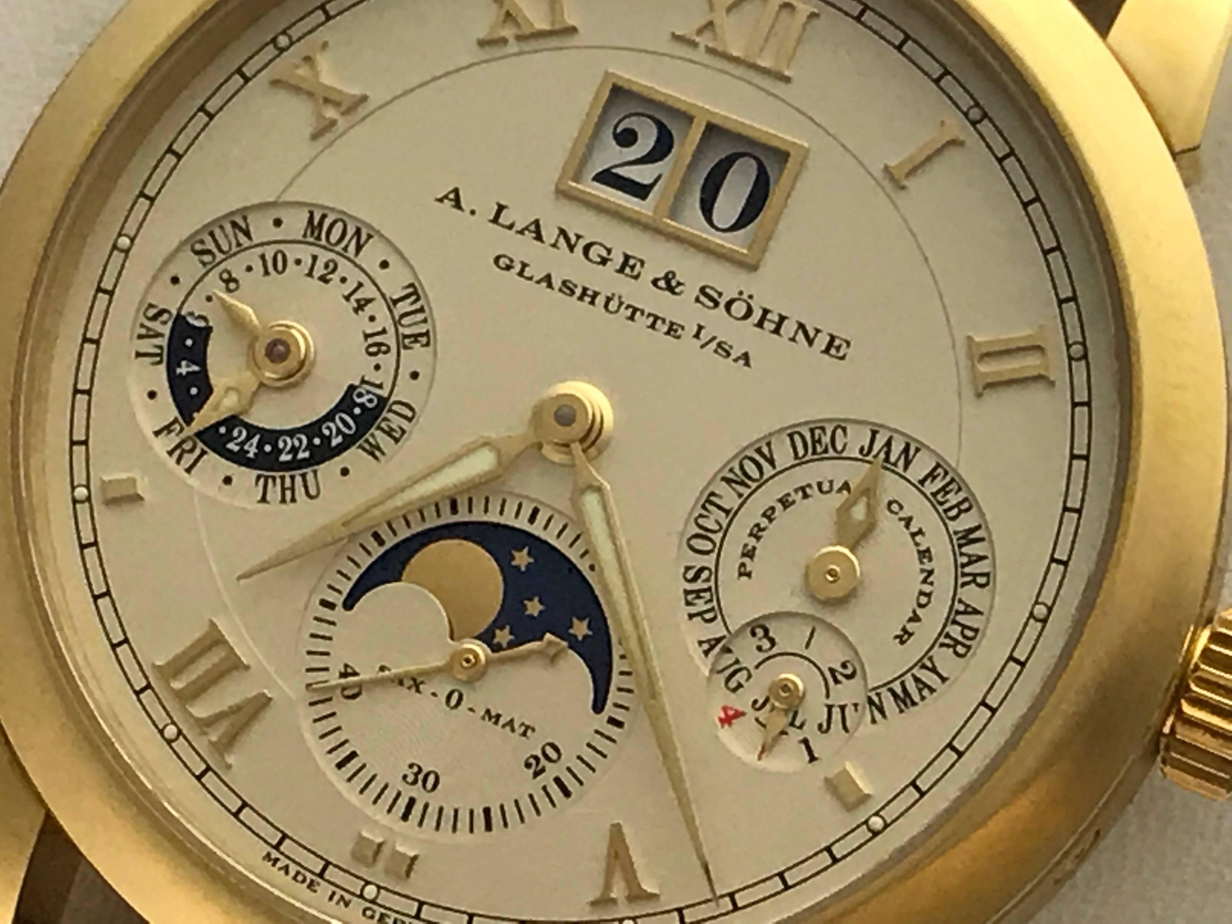 A. Lange & Söhne Langematik Perpetual Calendar Moonphase Leap Year and 24 Hour Indicators Mens 18K Yellow Gold wrist watch.  Model 310.032. Certified pre-owned and ready to ship.  Absolutely like new.  18K Yellow Gold round case with exposition back