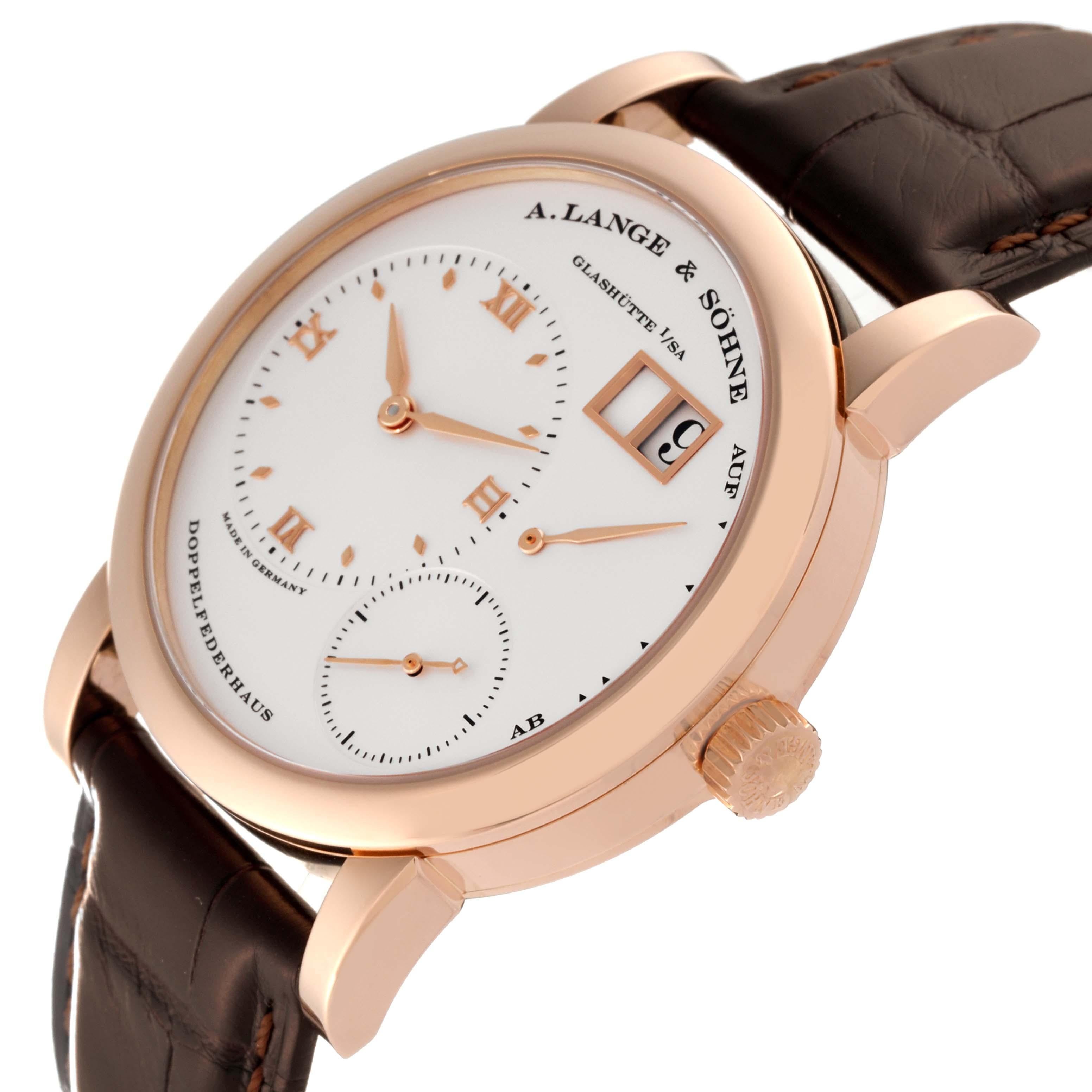 A. Lange and Sohne Lange 1 Rose Gold Silver Dial Mens Watch 101.032 Box Papers. Manual-winding movement. 18K rose gold case 38.5 mm in diameter.  Case thickness 10.4mm. Transparent exhibition sapphire crystal caseback. Quick date-correction button