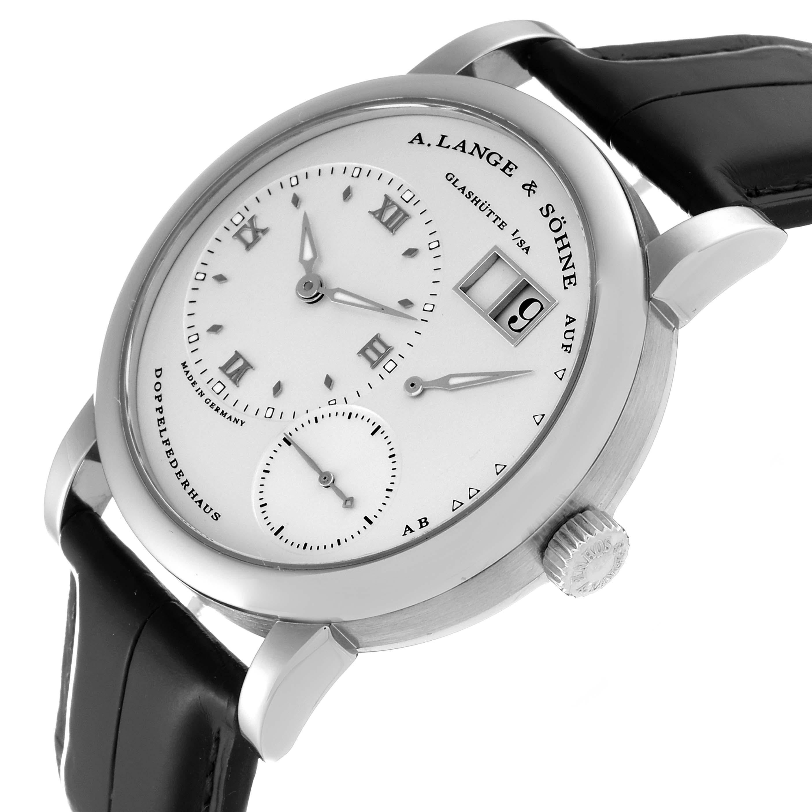 A. Lange and Sohne Lange 1 White Gold Silver Dial Mens Watch 101.039. Manual-winding movement. 18K white gold case 38.5 mm in diameter. Transparent exhibition sapphire crystal case back. Quick date-correction button located on the case edge at the