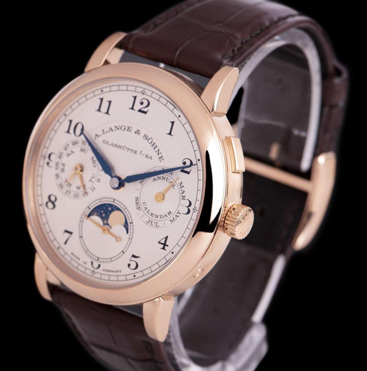 A 40mm 18k Rose Gold 1815 Annual Calendar Gents Wristwatch, silver dial with arabic numbers, month sub-dial at 3 0'clock, moonphase display and small seconds at 6 0'clock, date and weekday sub-dial at 9 0'clock, a fixed 18k rose gold bezel, an