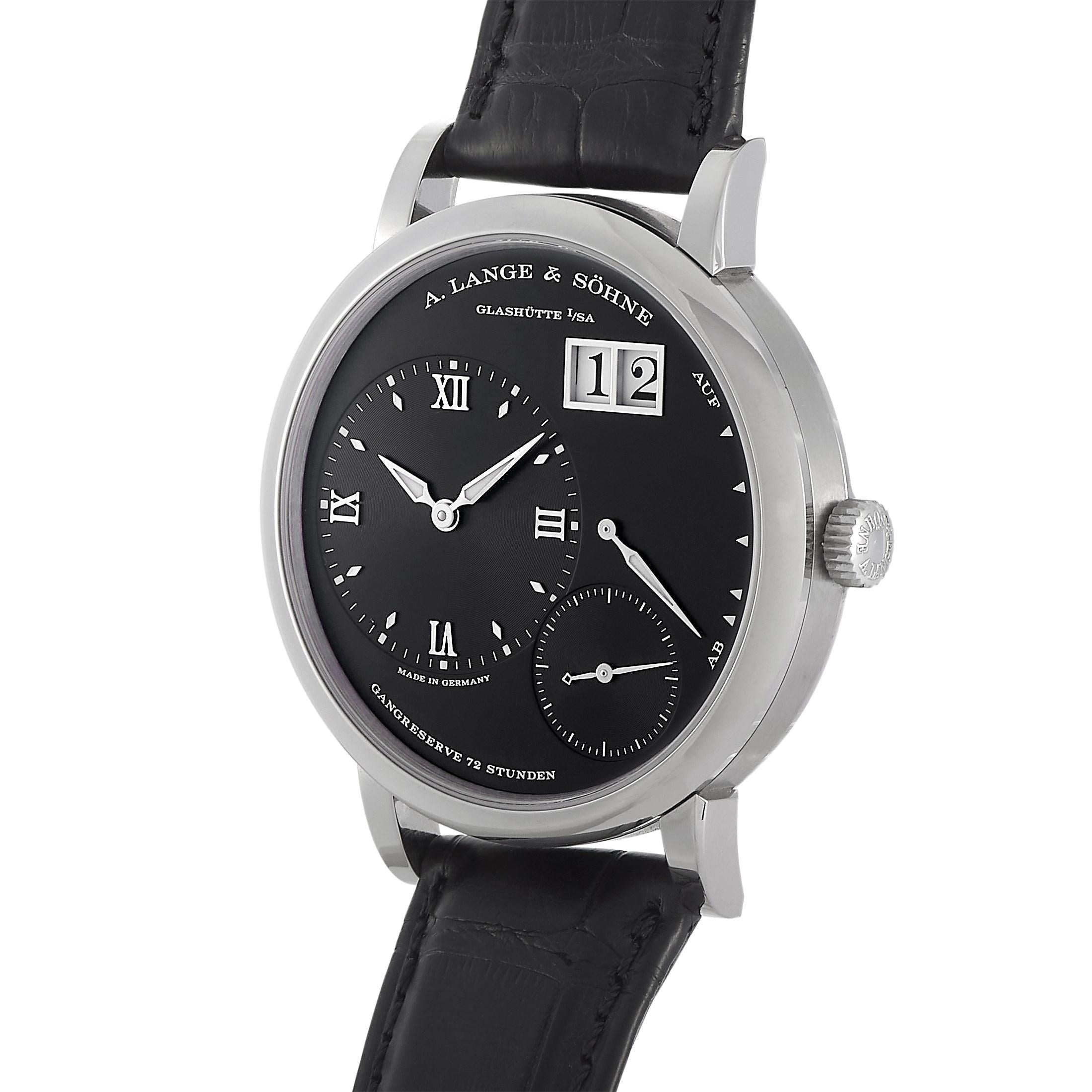 The A. Lange & S_hne Grand Lange 1 is a watch you can wear on almost any occasion. The extremely durable and elegant 18K white gold case holds an alluring black dial covered with scratch-proof sapphire crystal. The dial displays an hour and minute