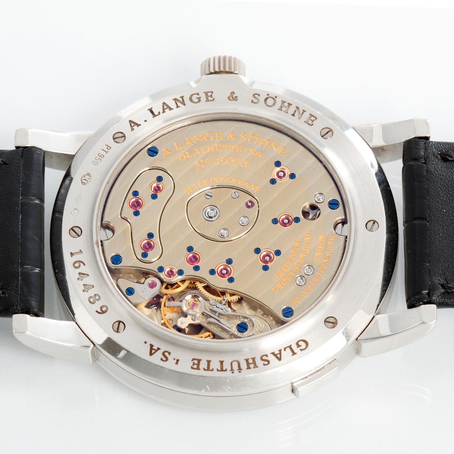 A. Lange & Sohne Grande Lange 1 Platinum Men's Power Reserve Big Date Watch 115.025 - Manual winding. Platinum case with exposition back (42mm diameter). Two-tone gold/silver with offset time dial with Roman numerals; subseconds, power reserve