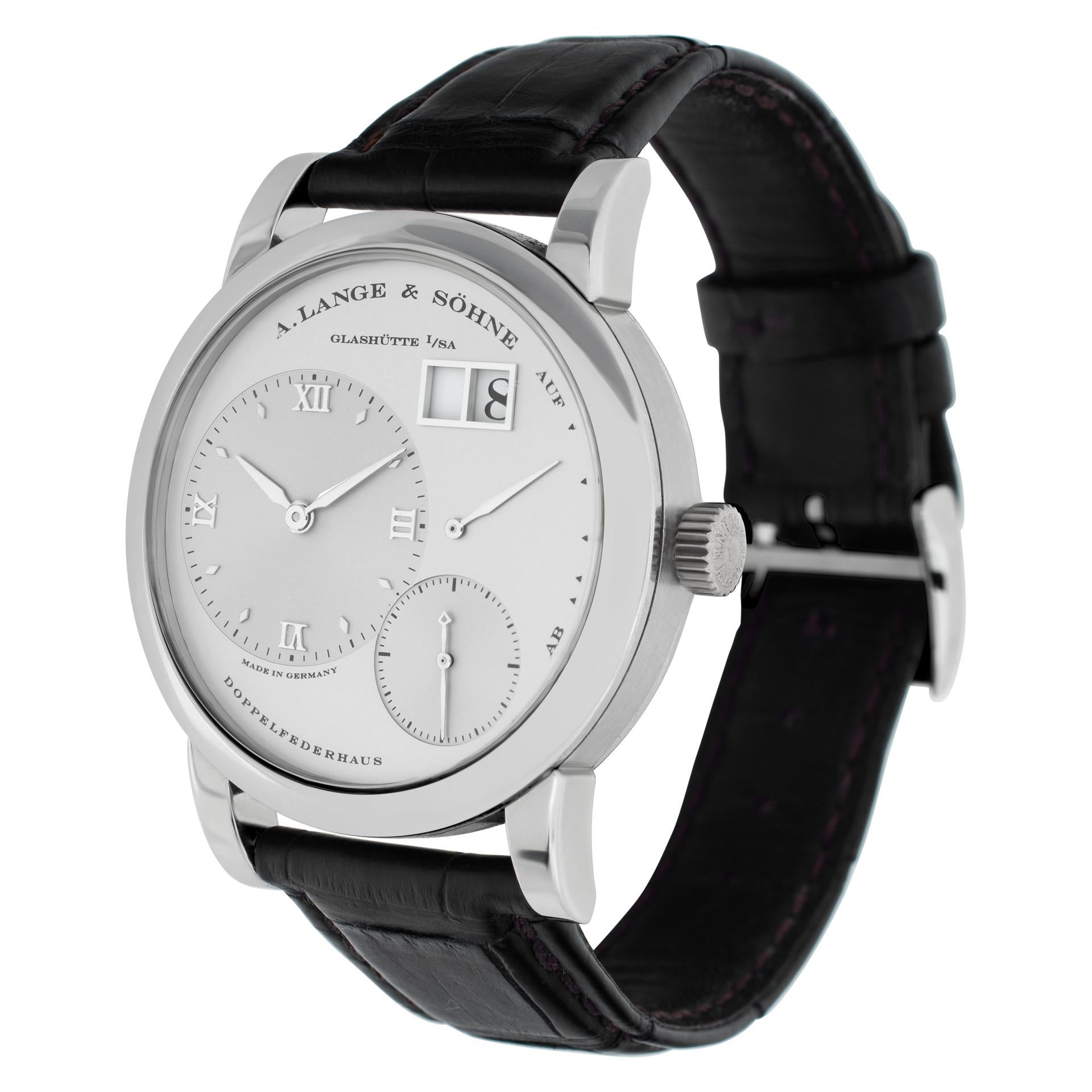 A. Lange & Sohne Lange 1 in platinum on leather strap. Manual wind movement under glass w/ subseconds and date. 38.5 mm case size. With box & booklets. Ref 101.025. Circa 2010s. Fine Pre-owned A. Lange & Sohne Watch. Certified preowned Dress A.