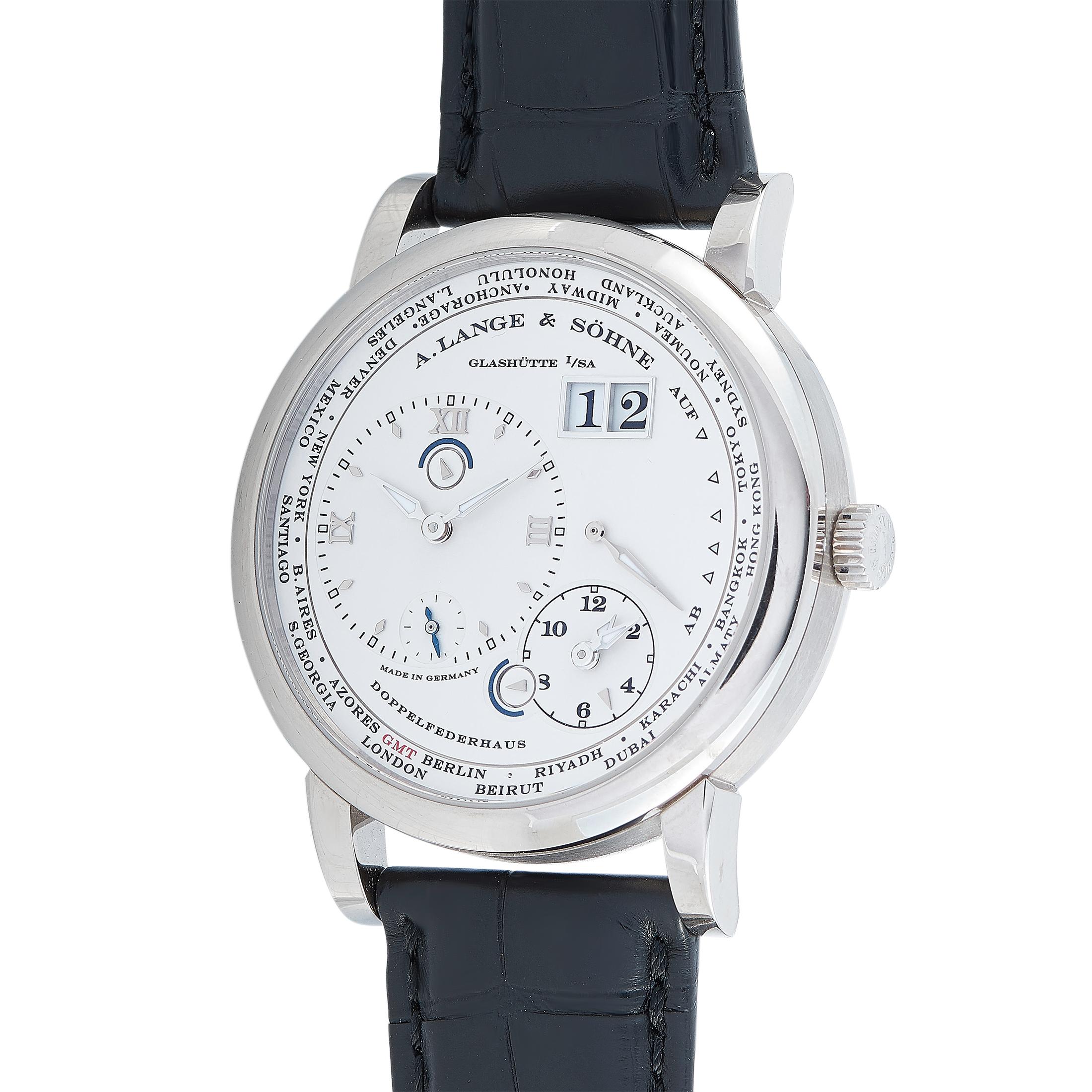 The A. Lange & Sohne Lange 1 Time Zone, reference number 116.039, is presented within the iconic “Lange 1” collection.

The watch comes with an 18K white gold case that boasts see-through back. The case is mounted onto a black alligator leather