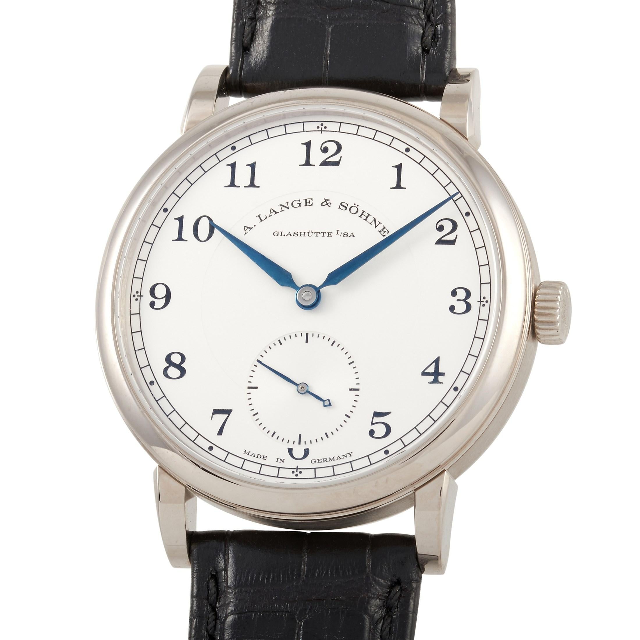 This A. Lange & Sohne Lange 1815 38.5mm 18K White Gold Watch, reference number 235.026, comes with an 18K white gold case that measures 38.5 mm in diameter. The case is presented on a sleek black Alligator leather strap with tang closure. The