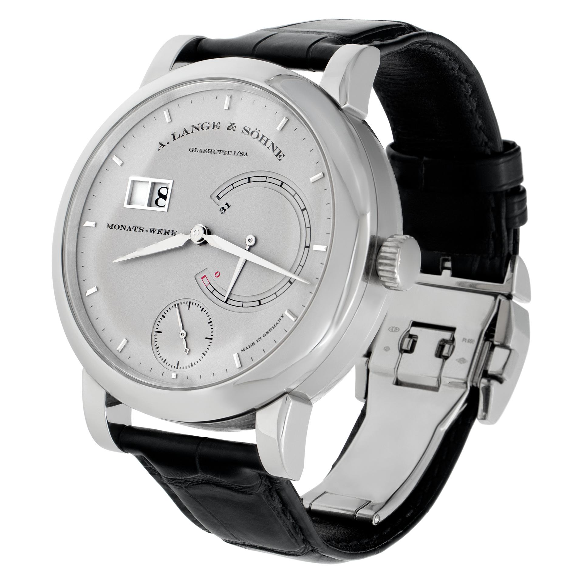 A. Lange & Sohne Lange 31 in platinum on an alligator strap with deployant buckle. Impressive 31 day power reserve. Manual w/ subseconds, date and power reserve indicator. 16 mm thick and 46 mm case width. With box, tools and blank gaurantee card.