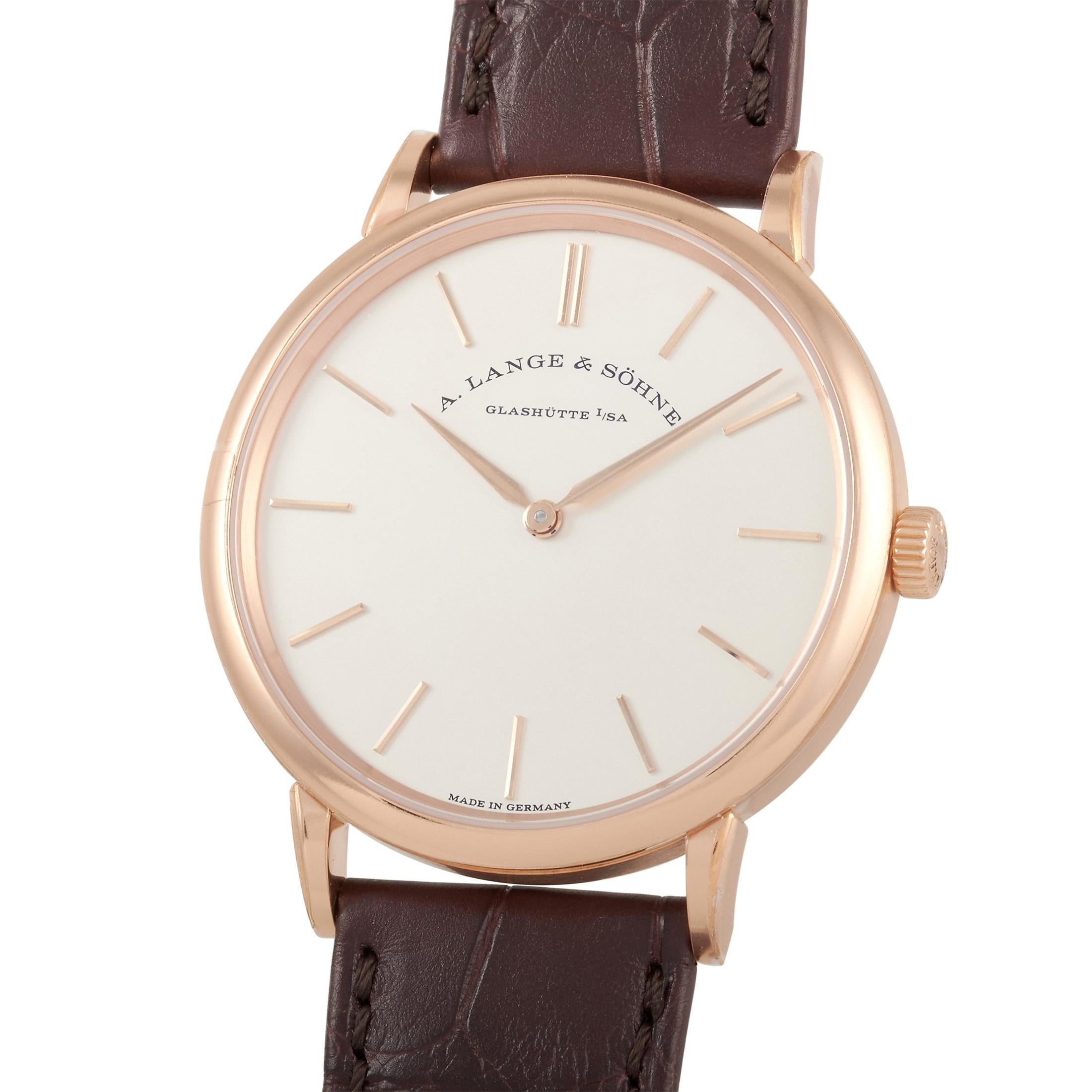 This A. Lange & Sohne Lange Saxonia Thin 37mm 18K Rose Gold Watch, reference number 201.033, comes with an 18K rose gold case that measures 37 mm in diameter. The case is presented on a brown Alligator leather strap with tang closure. The