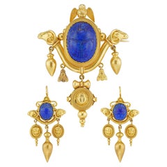 A Lapis And Gold Archaeological Revival Suite