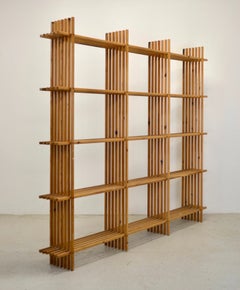 A larch wood geometric bookcase - France 1960.