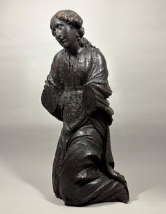 A large 16th century wood carving of an Angel