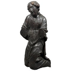 A large 16th century wood carving of an Angel