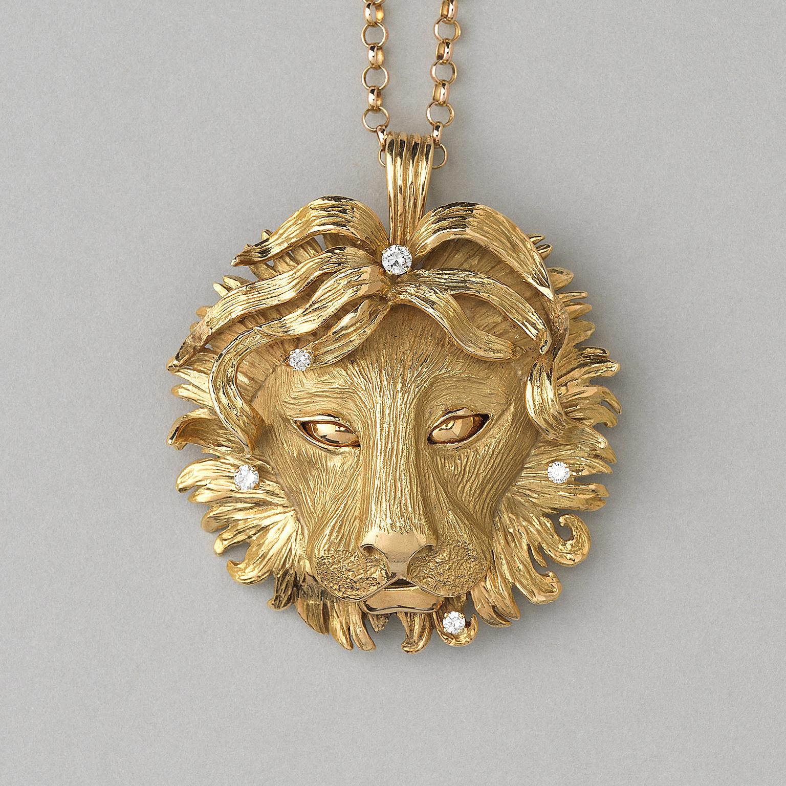 A large 18 carat gold leo pendant decorated with five brilliant cut diamonds (app. 0.41 carat in total) with wild manes and different chased textures, with vertical master mark PL and a hawk in between, France circa 1970.

weight: 55.64