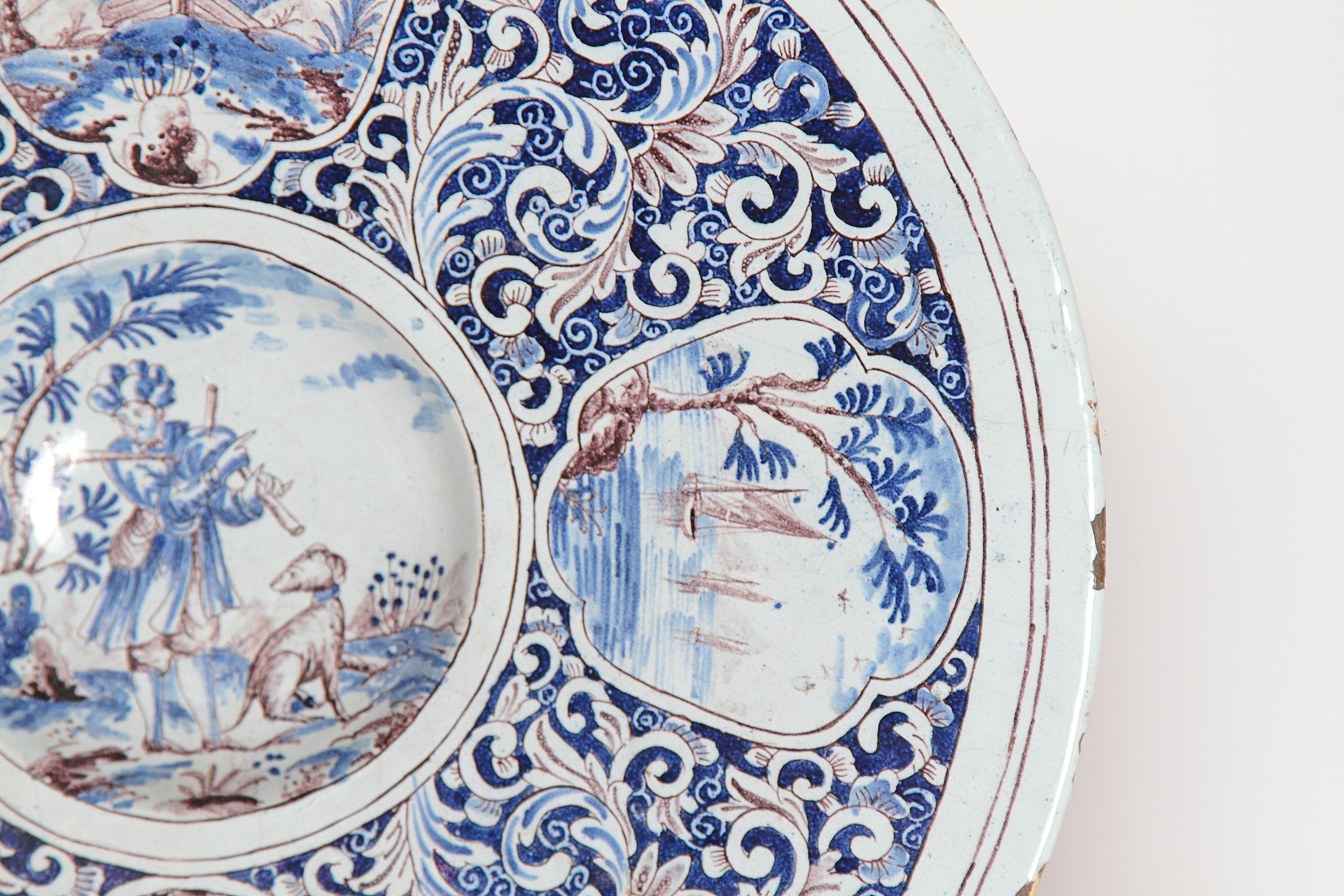 18th Century and Earlier A Large 18th Century Delft Faience Charger with Floral Cartouches For Sale