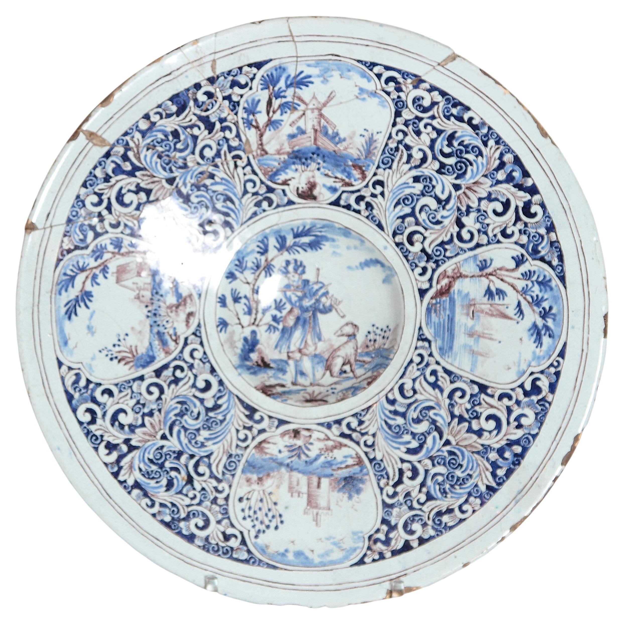 A Large 18th Century Delft Faience Charger with Floral Cartouches For Sale