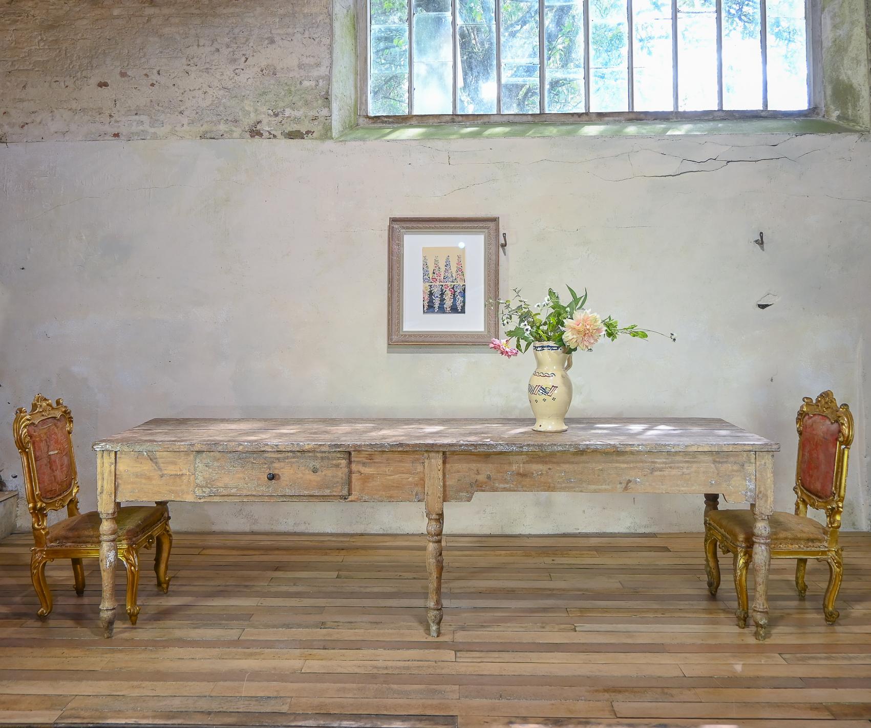 Presenting a captivating piece of history, this 18th-century French farmhouse table boasts a timeless elegance.
Embrace the allure of centuries past with this exquisite French farmhouse table, an extraordinary testament to the artistry and