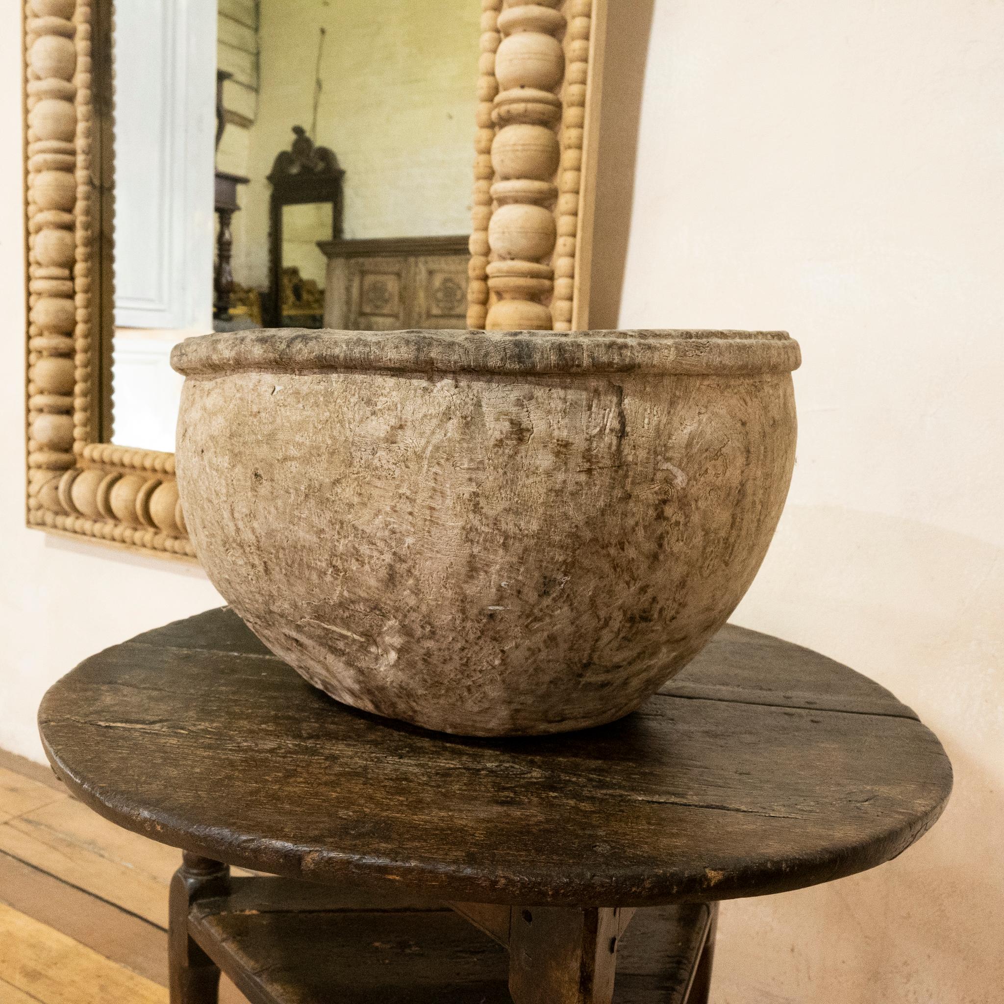An exceptional large 18th century primitive Swedish carved wooden burl root or knot bowl. Demonstrating a dry textured surface displaying a fabulous aged patina. A truly remarkable piece, that would make a great statement in any room!
 
Measures: