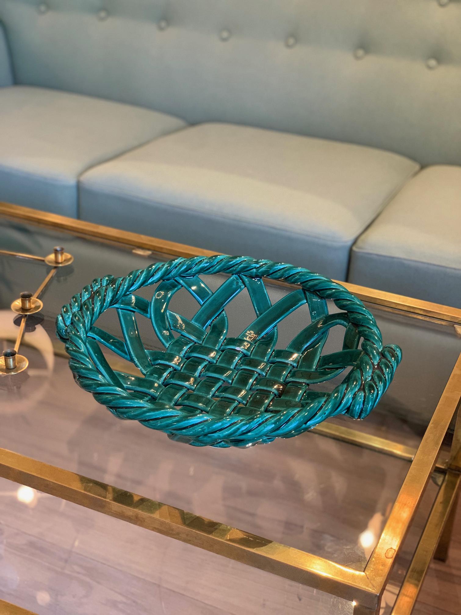 A large emerald green ceramic bowl, attributed to Jerome Massier
Combining a twisted rope and lattice designs, this work is most probably from the Vallauris workshop of Jerome Massier
France, circa 1950.