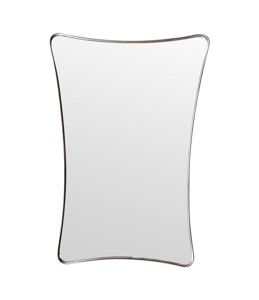 Mid-Century Modern A large 1950s orignal Italian shield mirror with solid brass frame. For Sale