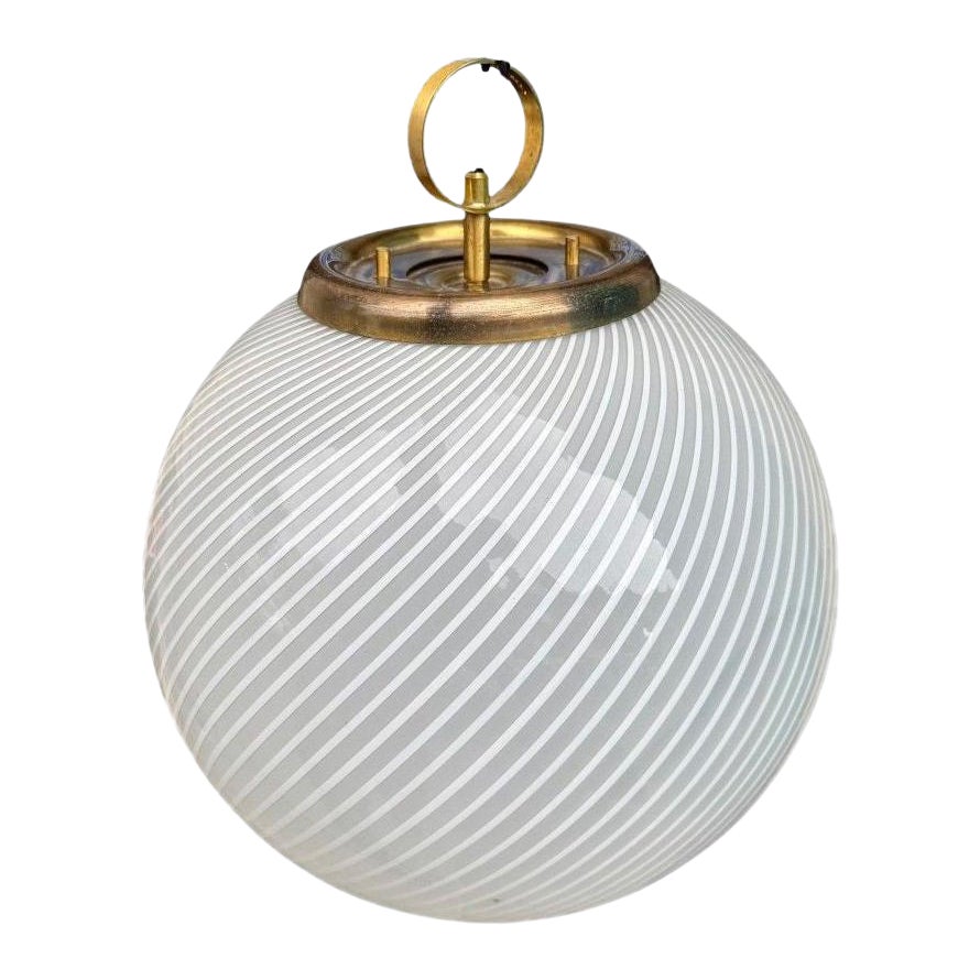 A large 1960s Venini Murano glass ball “Tessuto” swirl pendant light