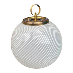 A large 1960s Venini Murano glass ball “Tessuto” swirl pendant light