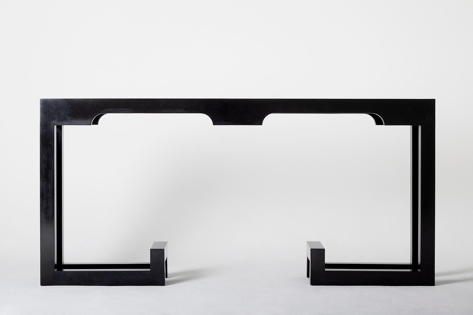 A large black lacquer console table
France, late 1970s.