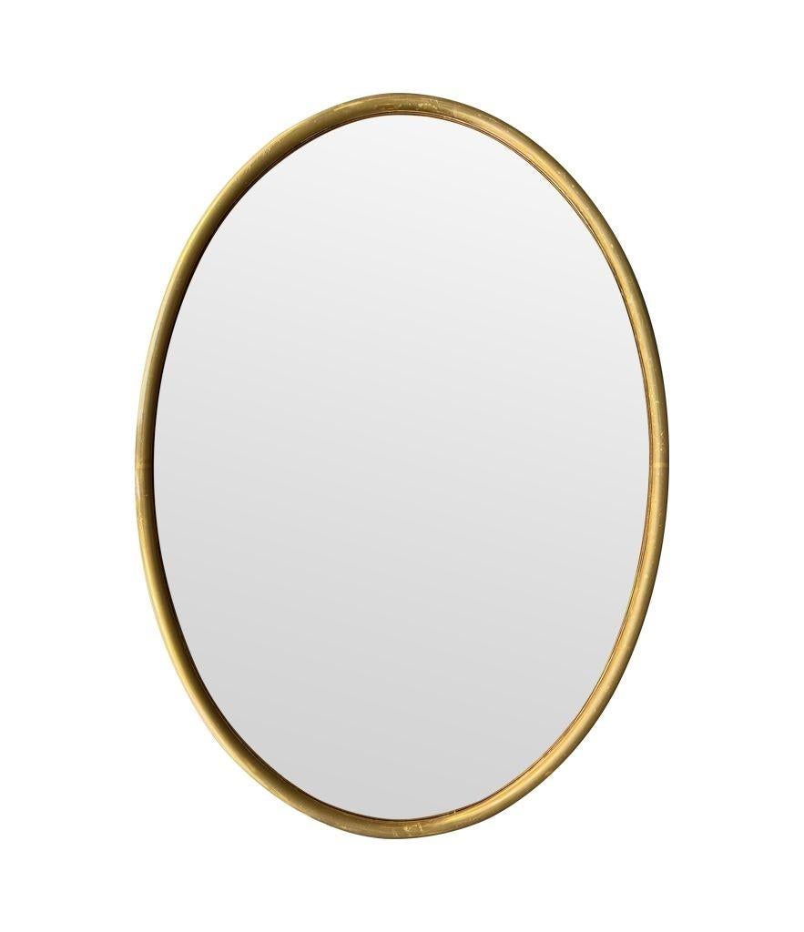 Grand miroir ovale italien des années 1970 avec cadre en laiton et plaque de miroir en bronze en vente 7