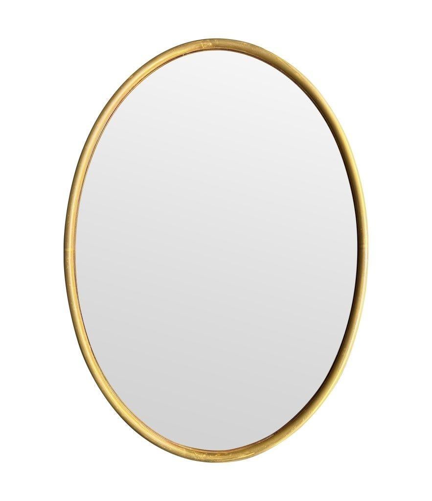 Grand miroir ovale italien des années 1970 avec cadre en laiton et plaque de miroir en bronze en vente 8
