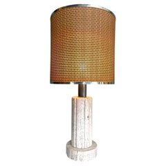 A large 1970s travertine lamp by Fratelli Mannelli with orignal rattan shade