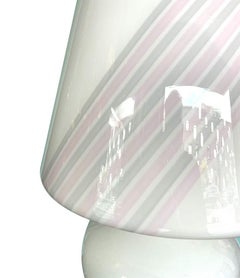 A large 1980s handmade Murano glass mushroom lamp with pink and grey stripes