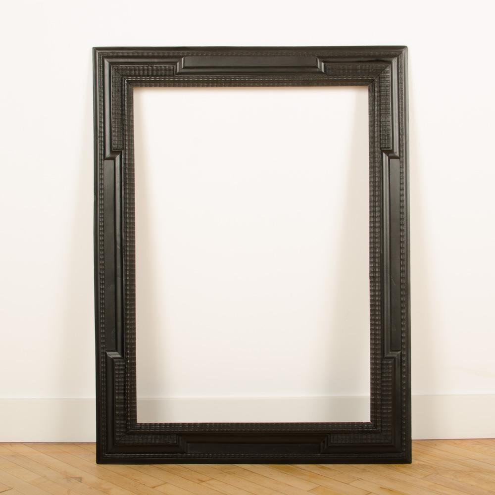 Large Nineteenth Century Dutch Style Ebonized Carved Wood Frame or Mirror In Good Condition In Philadelphia, PA