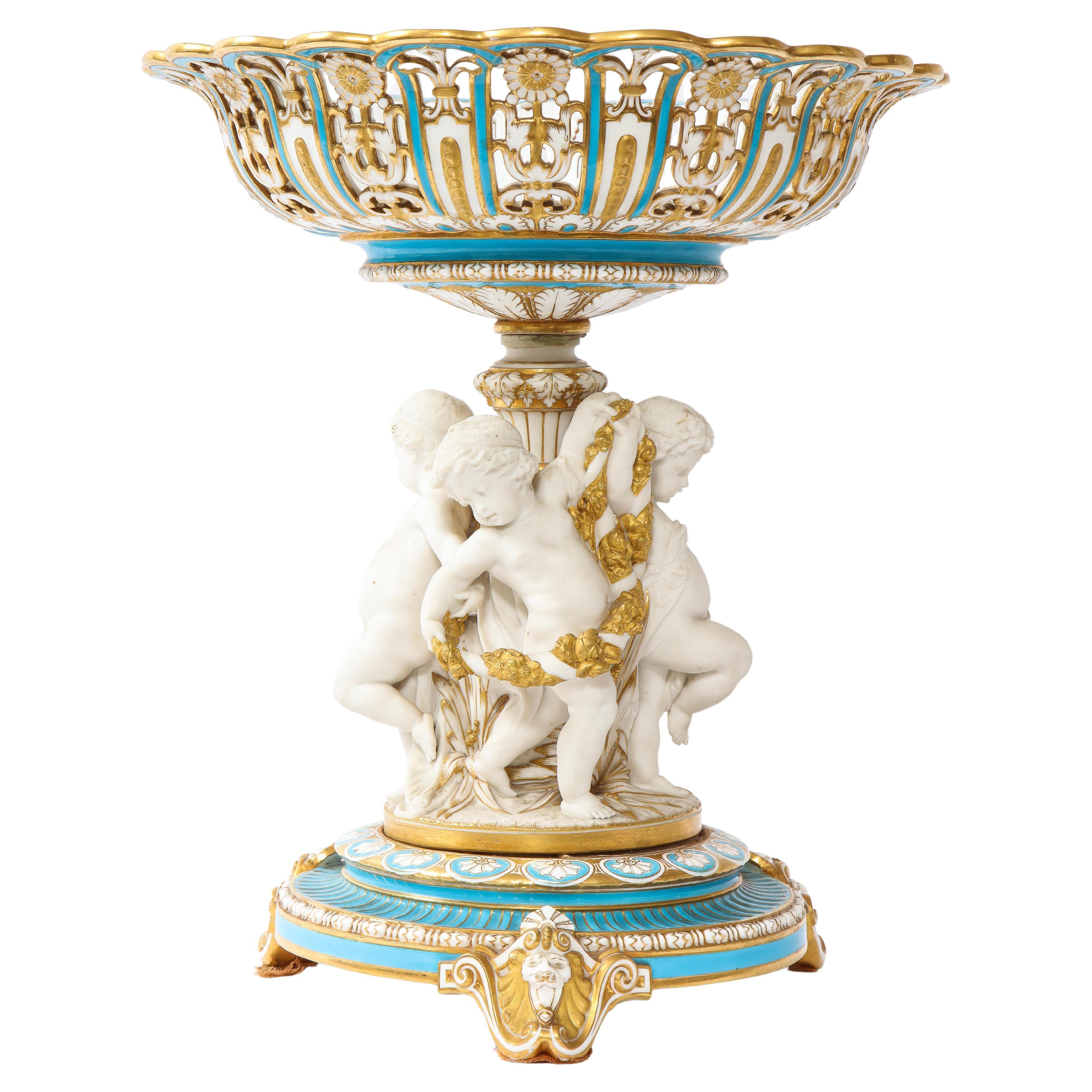 A Large 19th C English Mintons Biscuit Porcelain Centerpiece with Dancing Putti