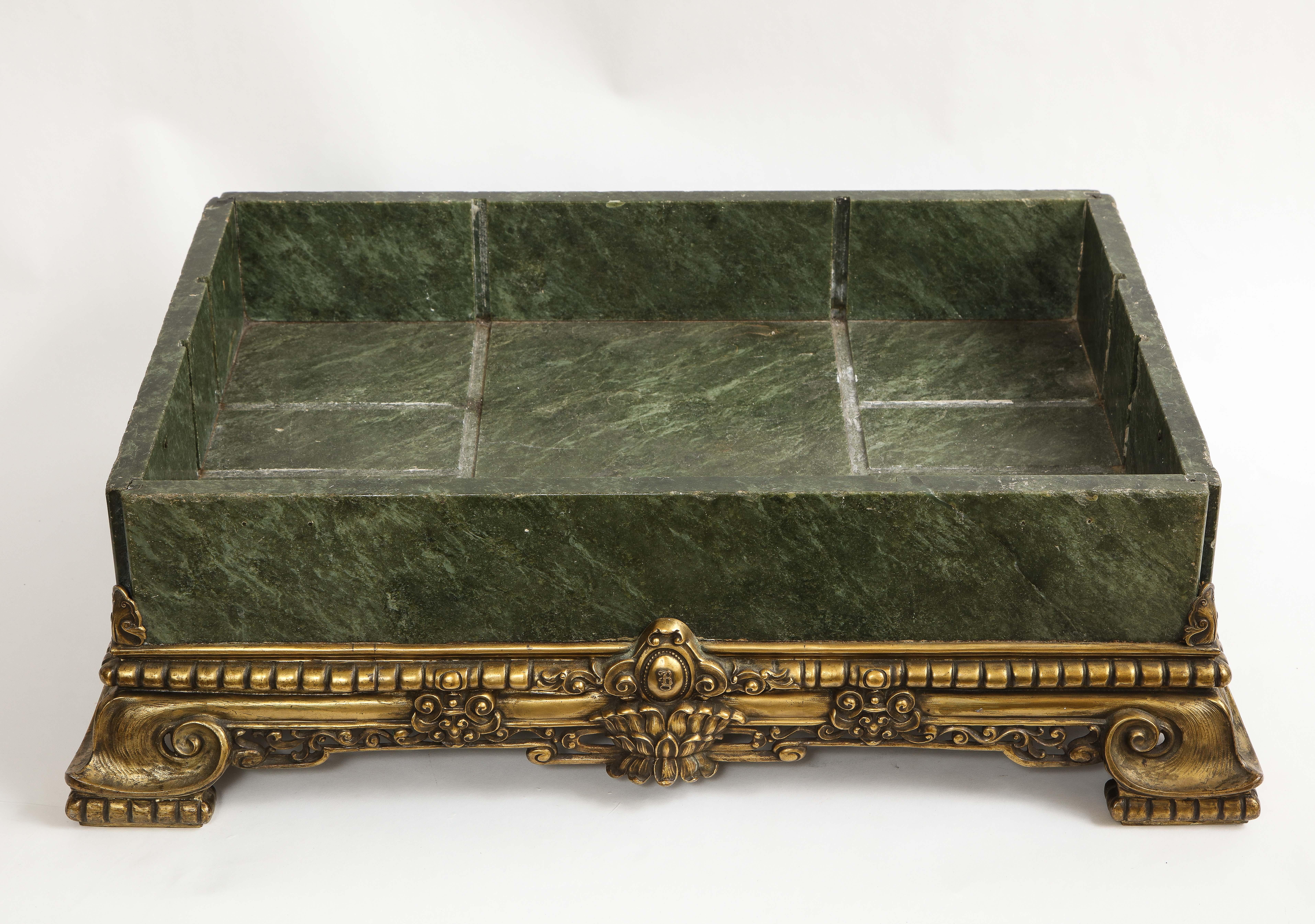 A Large 19th century Russian Louis XVI Style dore bronze mounted aventurine Hand-Carved Centerpiece. The mottled green appearance of the aventurine is truly beautiful. The rectangular piece of stone is hand-carved and further hand-polished, then
