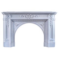A Large 19th century Belgian Laurel Arched Fireplace Mantel 