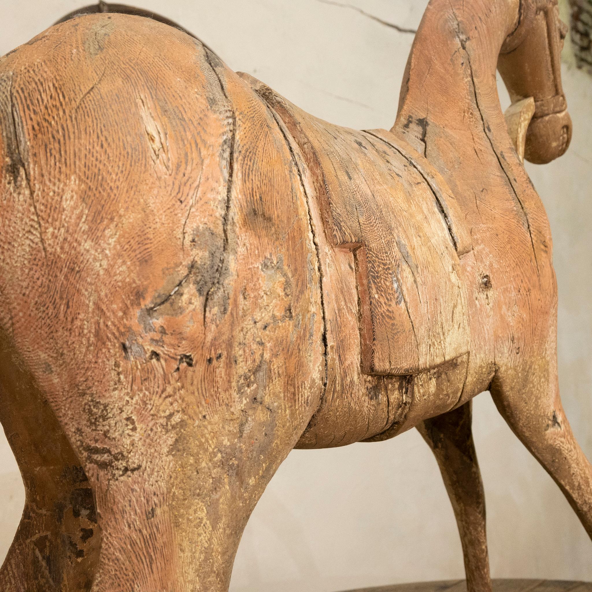 A highly decorative 19th century carved Swedish horse. A charming and well-executed design, displaying traces of original paint. 
 
Measures: Height - 70cm
Width - 60cm
Depth - 19cm.