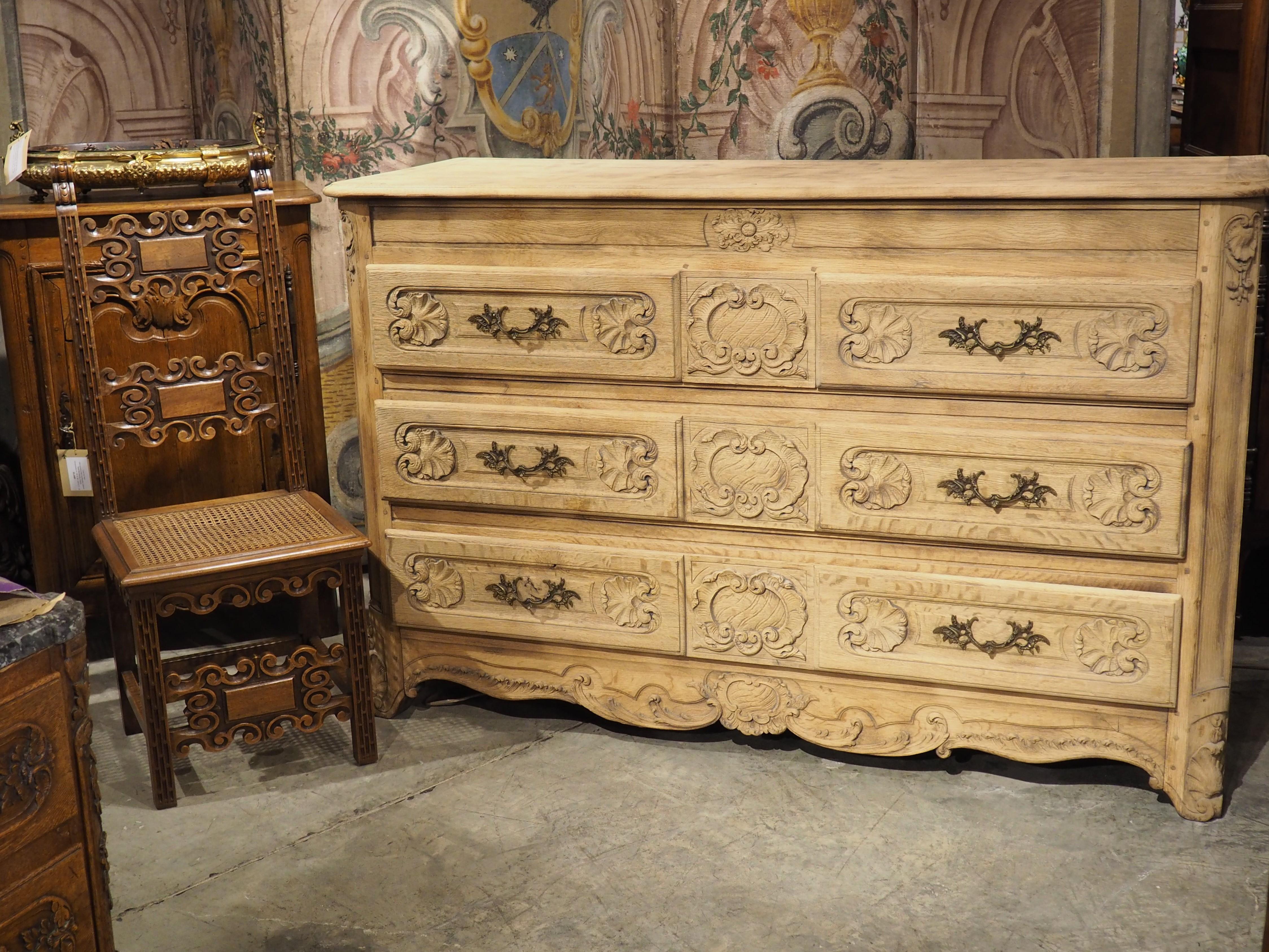 French A Large 19th Century Carved Oak Commode from France For Sale