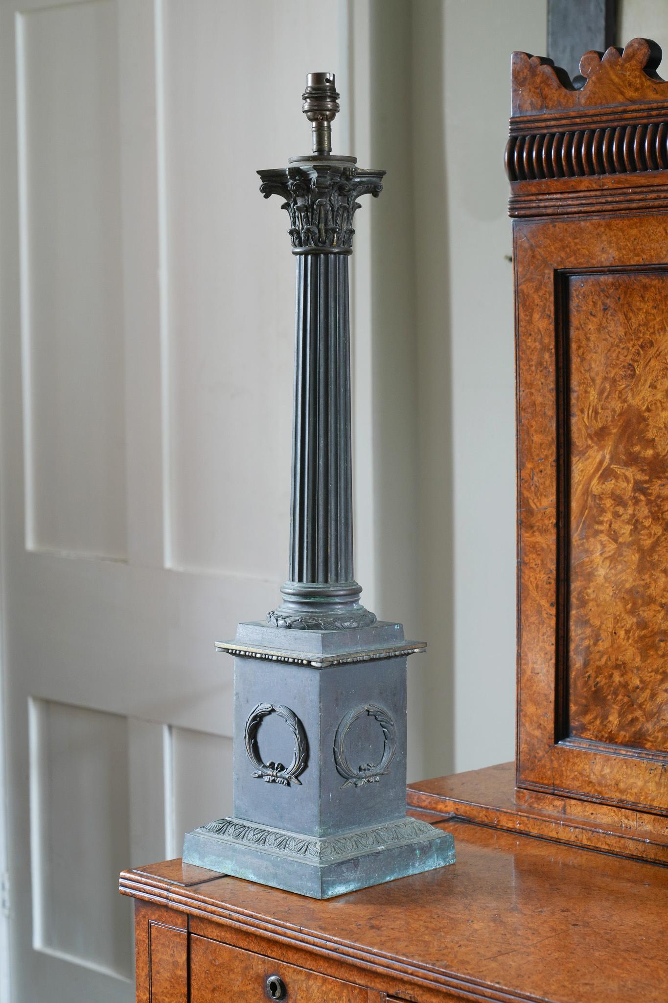 A large patinated bronze classical column table light.