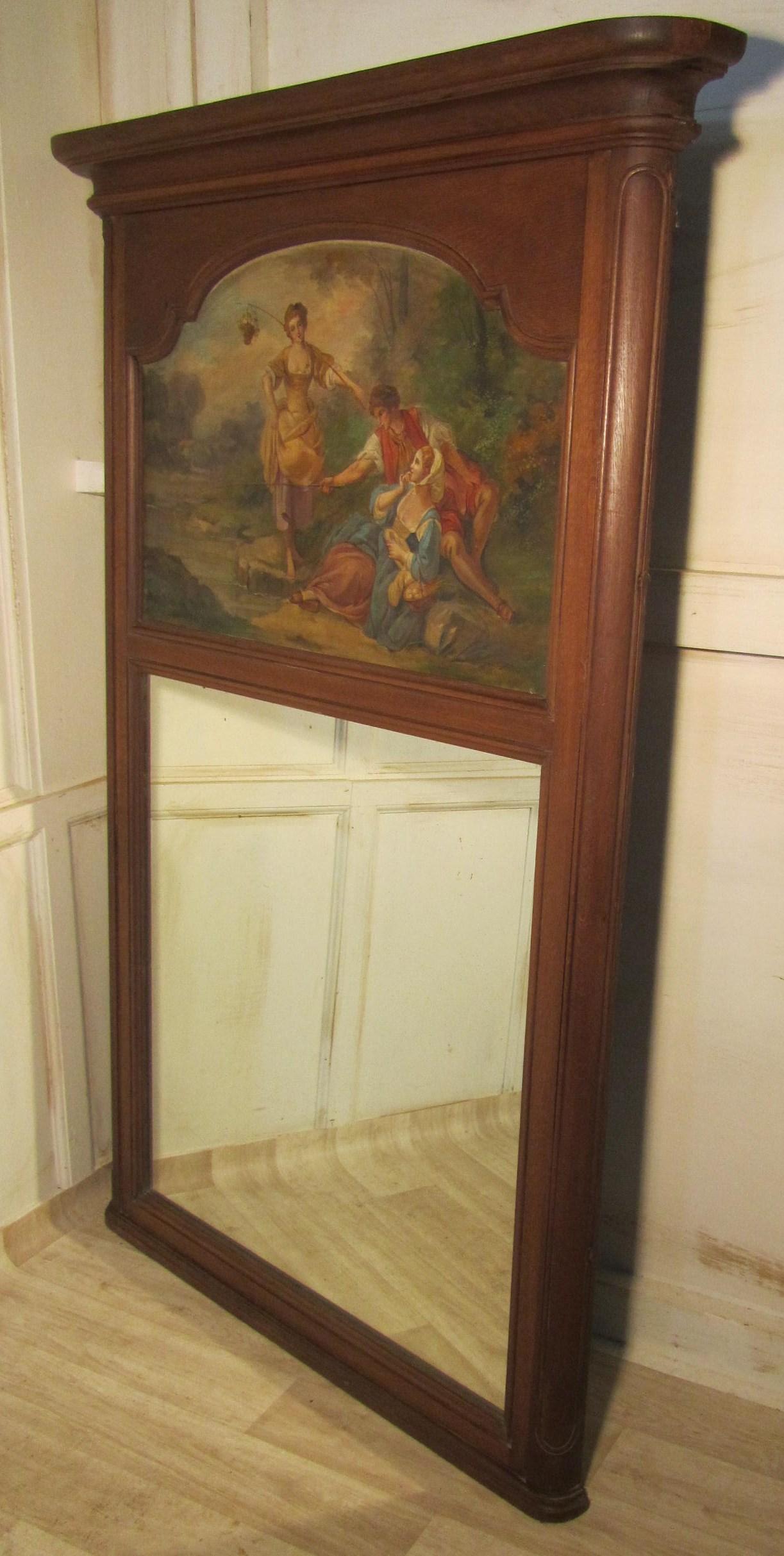 A large 19th century French oak trumeau mirror, oil on canvas

19th century oil on canvas set with a wall mirror in an oak frame, the unsigned painting is superbly executed it depicts three young people fishing and enjoying the countryside and