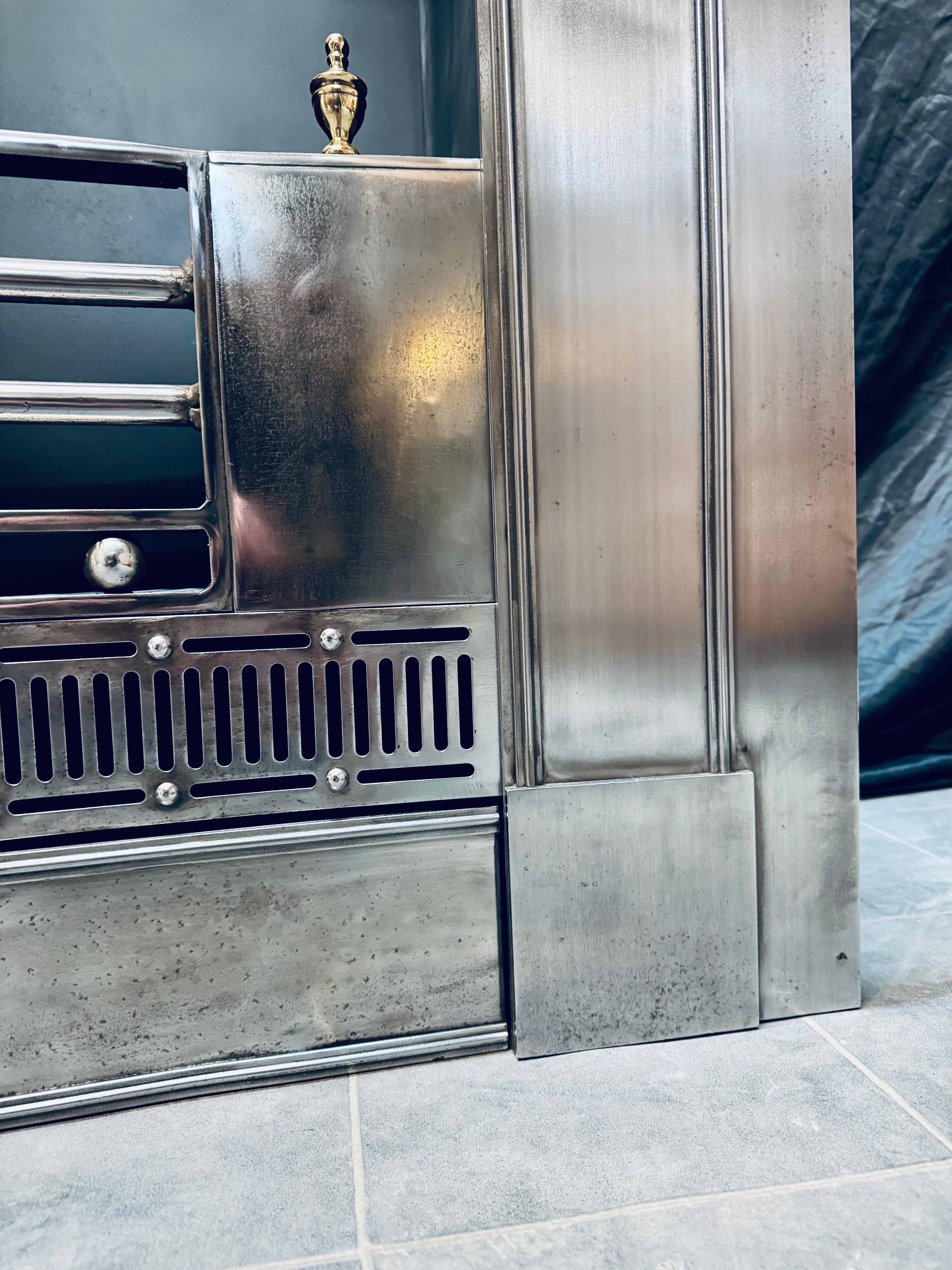 A large 19th Century Georgian Manner Polished
Steel Fireplace Insert. For Sale 6